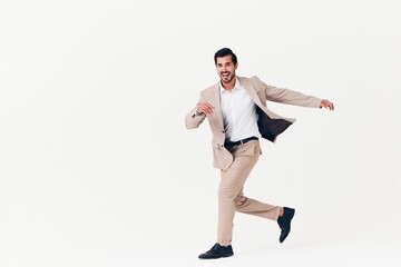 running man victory businessman suit happy smiling business confident beige winner