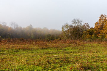 mountainous terrain, foggy morning, autumn walks in the bosom of nature, the state of nature with the approach . winters.