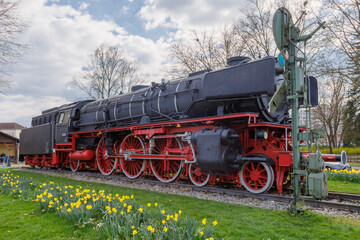 Steam locomotive in Treuchtlingen. The express locomotive 01 220 as a monument in Treuchtlingen. The locomotive is registered as a monument in the Bavarian monument list.