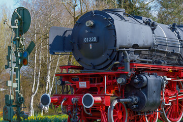 Steam locomotive in Treuchtlingen. The express locomotive 01 220 as a monument in Treuchtlingen. The locomotive is registered as a monument in the Bavarian monument list.