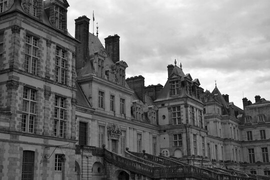 Fontainebleau, France - July 31th 2015 : Main facade of the Fontainebleau castle. It's a famous residence of the king Francis the first, and it's close to Paris.