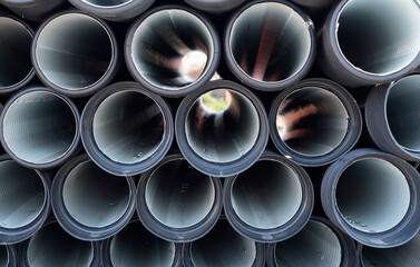 construction pipes stacked on the street