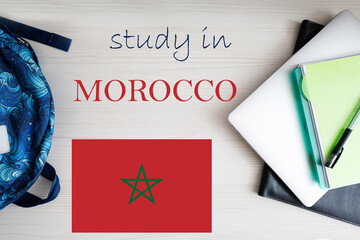 Study in Morocco. Background with notepad, laptop and backpack. Education concept.