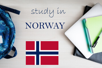 Study in Norway. Background with notepad, laptop and backpack. Education concept.