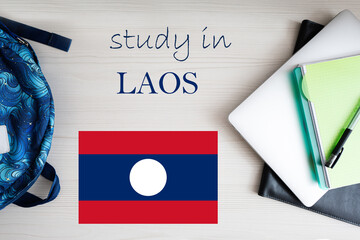 Study in Laos. Background with notepad, laptop and backpack. Education concept.