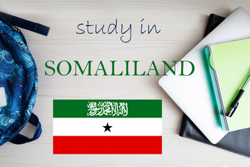Study in Somaliland. Background with notepad, laptop and backpack. Education concept.