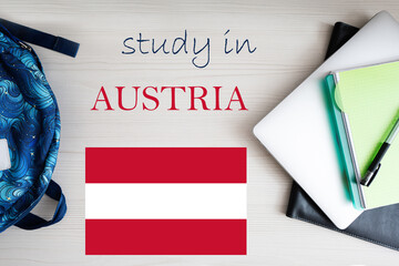 Study in Austria. Background with notepad, laptop and backpack. Education concept.