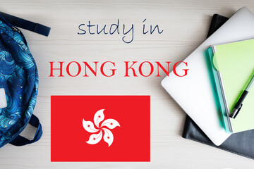Study in Hong Kong. Background with notepad, laptop and backpack. Education concept.