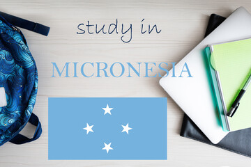 Study in Micronesia. Background with notepad, laptop and backpack. Education concept.