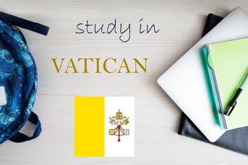 Study in Vatican City. Background with notepad, laptop and backpack. Education concept.