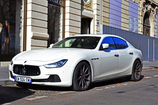 Paris, France - October 26th 2019 : White Maserati ghibli parked in George V avenue. 