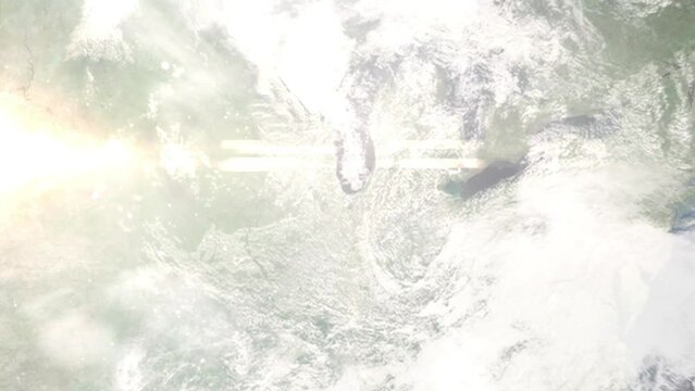 Earth zoom in from outer space to city. Zooming on Gary, Indiana, USA. The animation continues by zoom out through clouds and atmosphere into space. Images from NASA