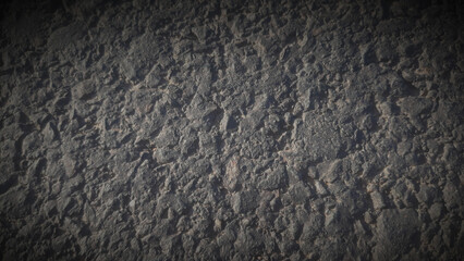 Black stone background. Long black stone texture and textured. Dirty black stone wall. Rock texture with cracks. stone tile floor texture. Old wall texture abstract natural background.