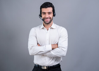 Male call center operator wearing headset and formal suit standing confidently on isolated...