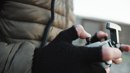 Drone Pilot with remote controller © francescosgura