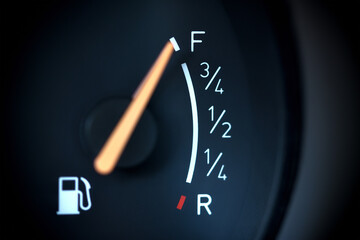 Close up shot of a fuel gauge in a car