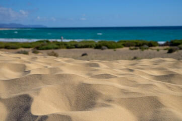 Fototapeta na wymiar Sandy dunes and turquoise water of Sotavento beach, Costa Calma, Fuerteventura, Canary islands, Spain