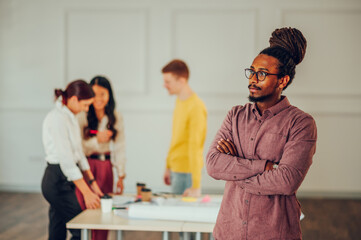 Fototapeta premium Portrait of an arabic man architect posing in the office during a meeting