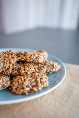 Vegan cookies made of banana and different seeds, photographed with natural light