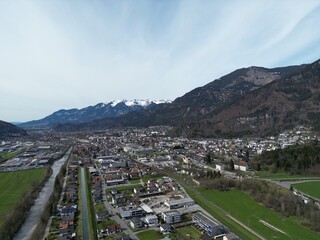 view of the city of Bludenz from the air, alpine landscape, spring