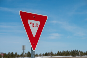 yield sign with blue sky
