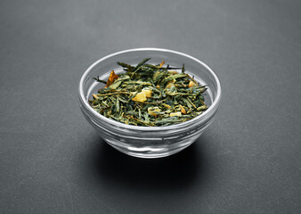 Tea in a bowl on a black