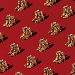 Stylish and glamorous wallpaper. A seamless bright pattern with a color contrast highlighted with the red background. Elegant high heel shoes with a leopard print create a daring design.