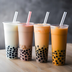 Set of four tall drinking glasses with straws with Taiwanese bubble or boba tea from vegan milk and agava sypur with different flavors isolated on background. Generative AI