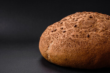 Fresh crispy brown bread with sesame seeds and spices
