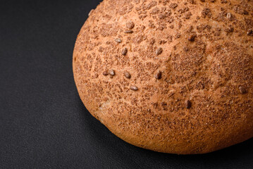 Fresh crispy brown bread with sesame seeds and spices
