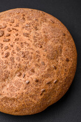 Fresh crispy brown bread with sesame seeds and spices