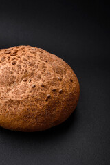 Fresh crispy brown bread with sesame seeds and spices
