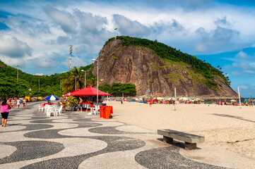 Copacabana and Leme beaches with kiosk and mosaic of sidewalk in Rio de Janeiro, Brazil. Copacabana...