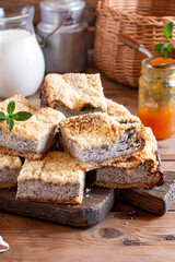 Cottage cheese poppy seed cake on a wooden board on a table