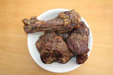  Roe wild meat on a wooden board