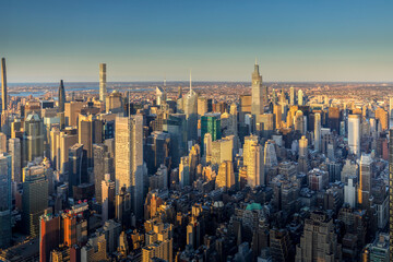 Fototapeta na wymiar New York, USA - April 30, 2022: Nice view of skyscrapers at sunset in Manhattan, New York City