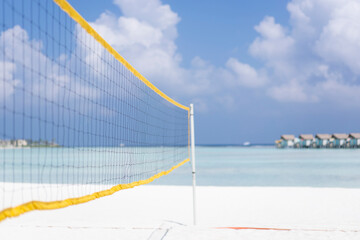 Fototapeta premium Beach volleyball net against the sea in the Maldives