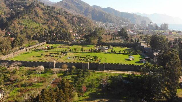 Aerial fly over top view historical site Gonio fortress - Roman fortification in Adjara, Georgia. Gonio-Apsaros Fortress