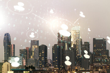 Double exposure of social network icons hologram on Los Angeles office buildings background. Networking concept