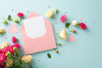 Mother's Day concept. Top view of an open pink envelope with blank space for copy or greeting with...
