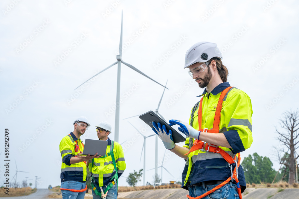 Poster engineer working at the natural energy wind turbine site,wind turbine operations that transform wind