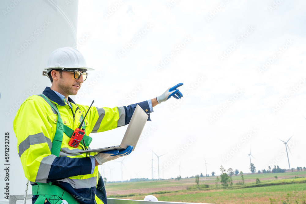 Poster engineer working at the natural energy wind turbine site,wind turbine operations that transform wind