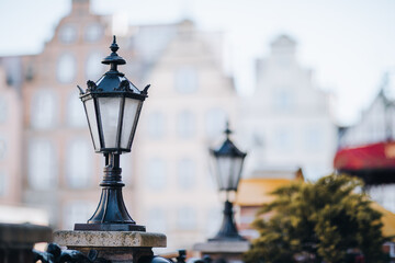 Obraz premium metal old street lamp on a blurred background 