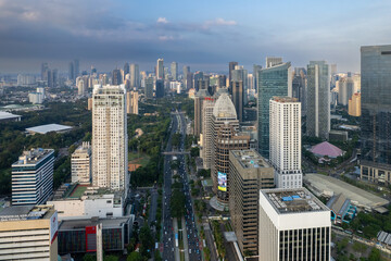 Obraz premium aerial photos of Sudirman street and Jakarta Skyline in the golden hour. 
