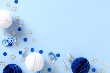 Yom Haatzmaut, Israel Independence Day banner template. Flat lay festive Jewish decorations on blue...