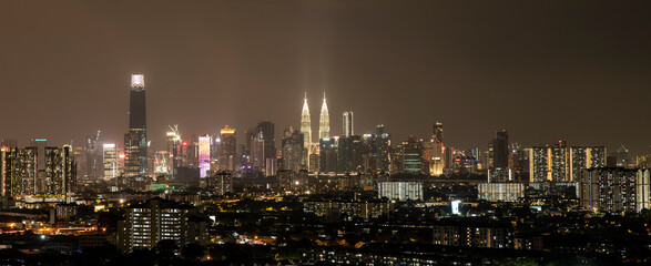 Night time panoramic view of Kuala Lumpur city with copy space