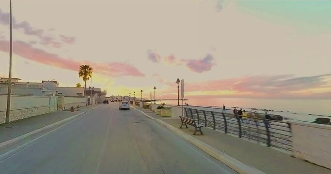 Tramonto con veduta a 360&deg; percorrendo il lungomare di Palese(Bari) in auto