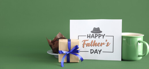 Greeting card for Father's Day, gift, muffin and cup of coffee on green background