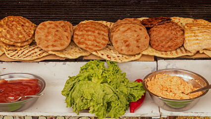 Hamburgers with side dishes