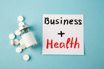 top view antivirus vaccine with pills and notes on blue background virus health pandemic covid- lab disease colors isolation